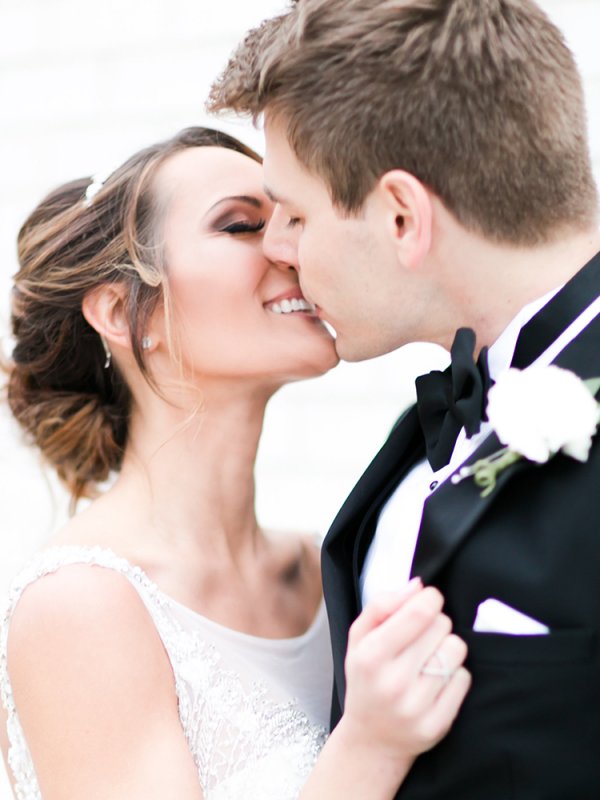 bride and groom kissing